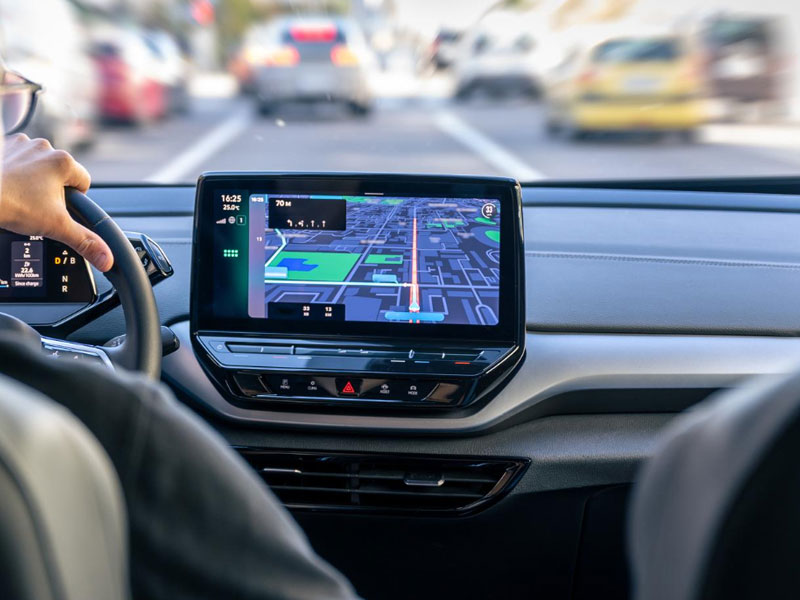 Android multimedia screen showing navigation in a car dashboard
